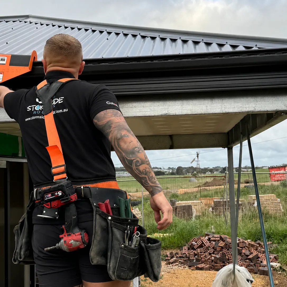Michael from Stormside Roofing installing a new metal roof and verandah